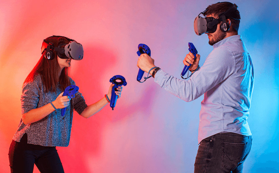 Man and woman in VR headsets